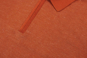 Orange zipped polo shirt